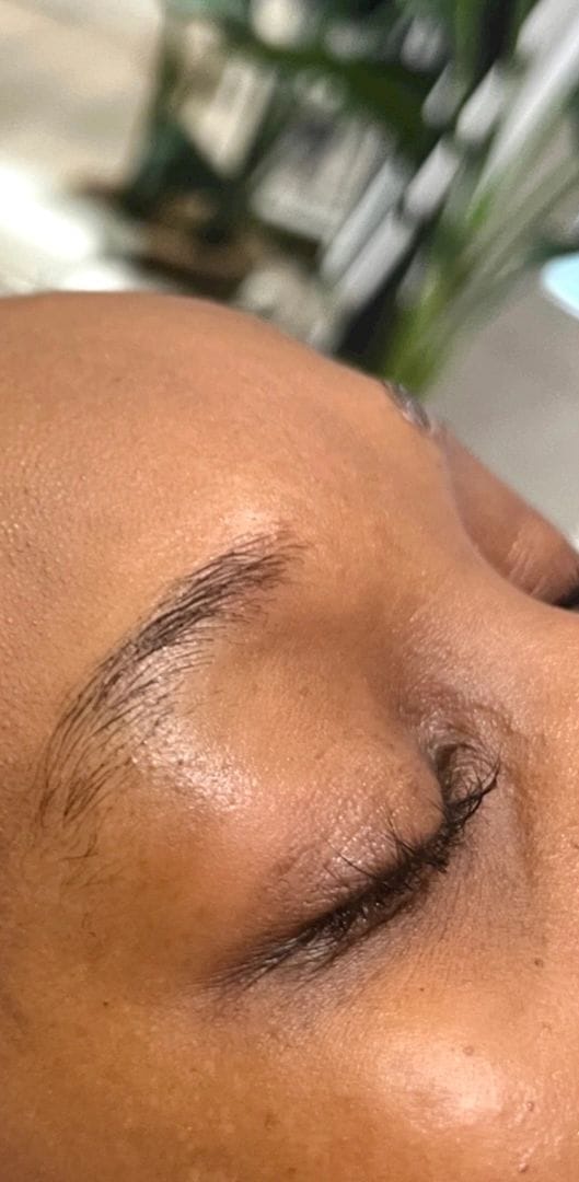 A client’s brow before lamination, sparse and growing in several directions
