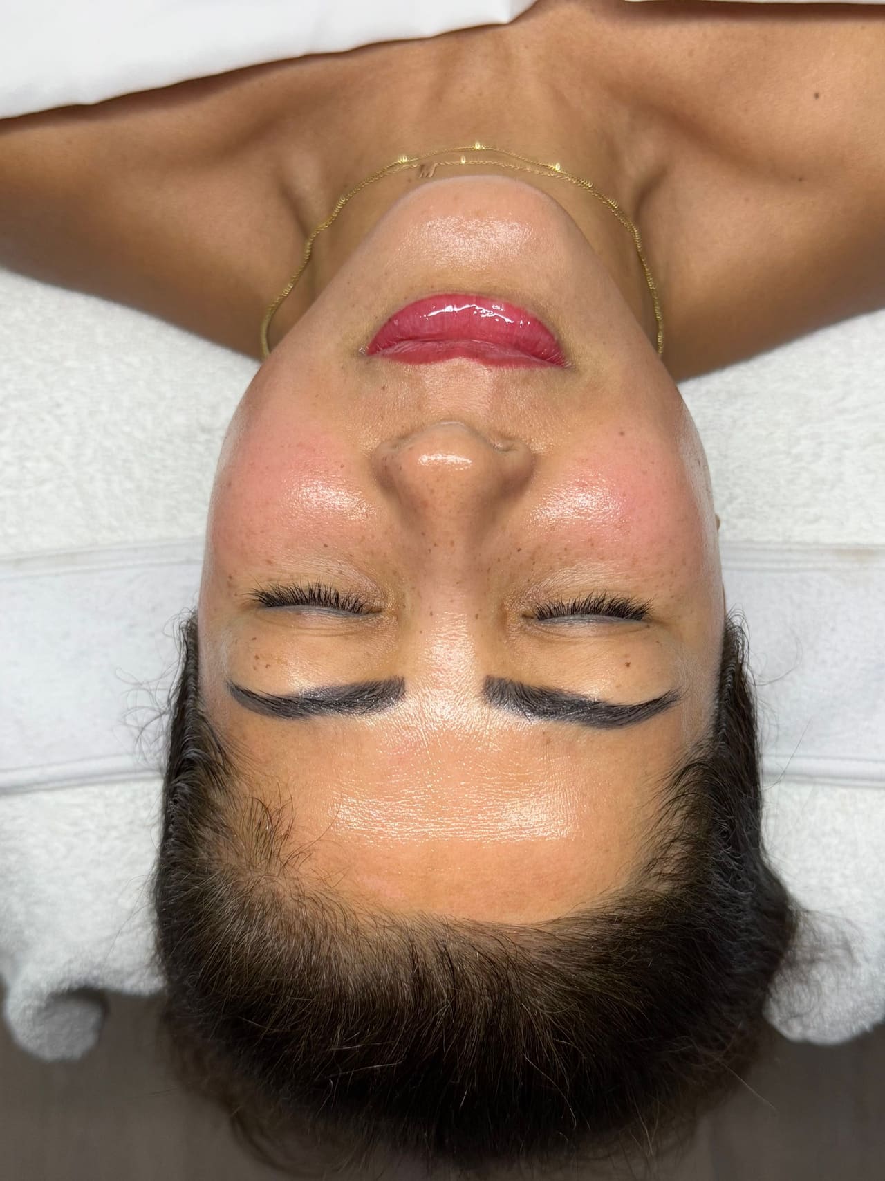 Close-up of laminated, tinted brows and lifted lashes after treatment