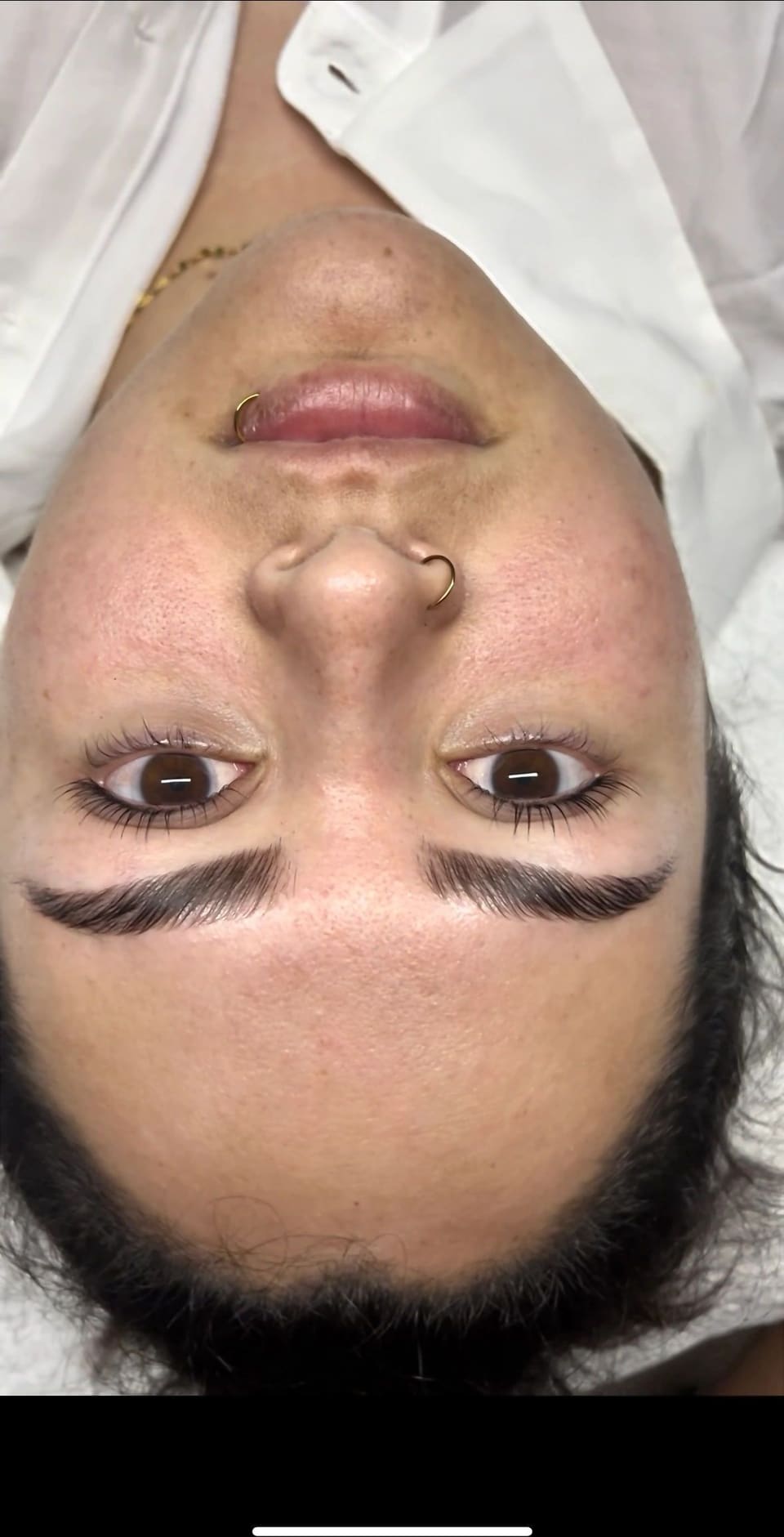 A client’s brows after shaping — a clean, defined line on both sides