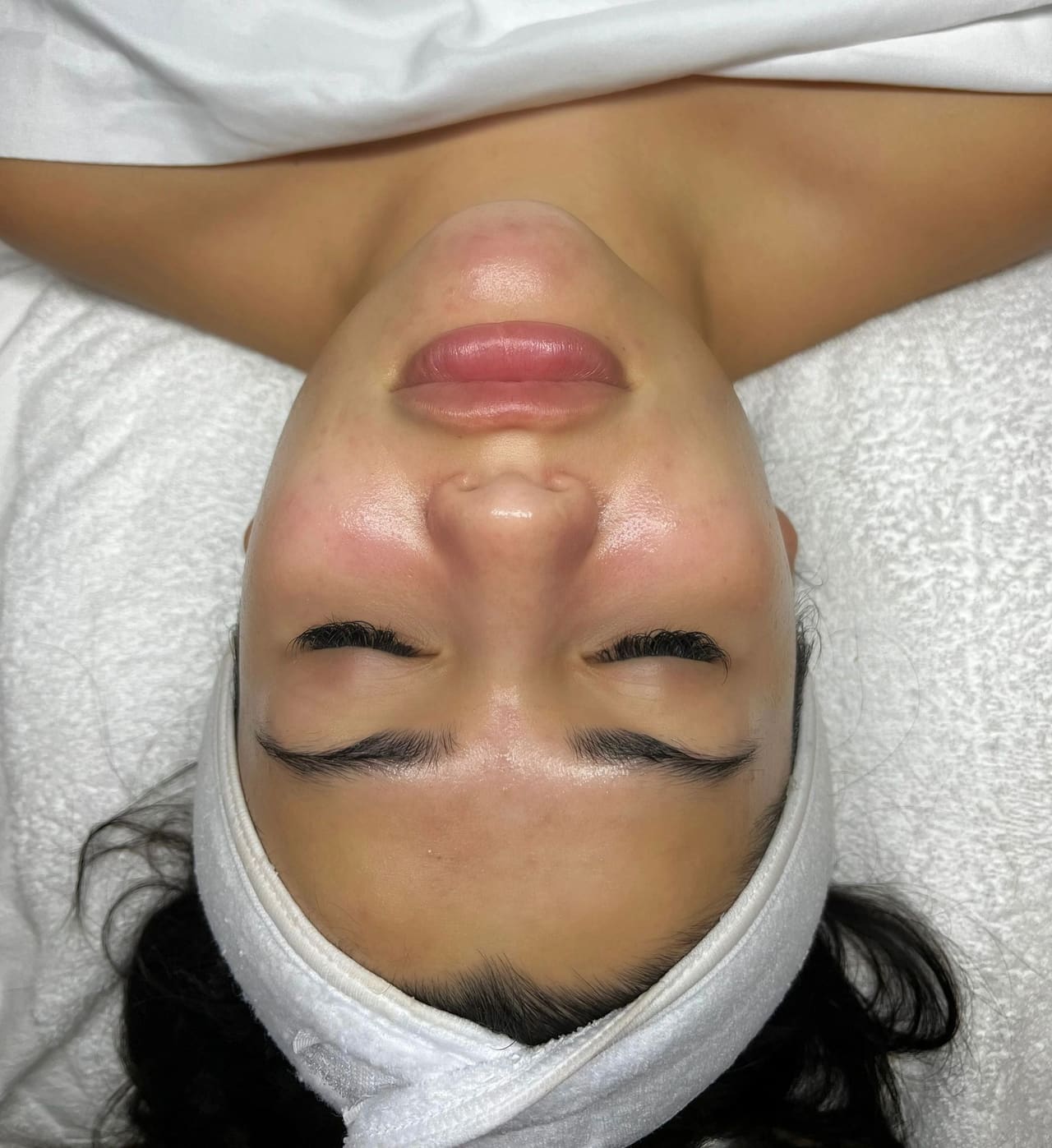A client’s refreshed, glowing complexion at the end of a facial